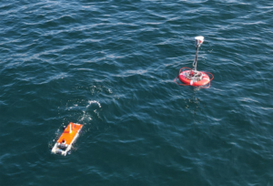 AUV HATTORI (left) and ASV BUTTORI (right) during a sea experiment